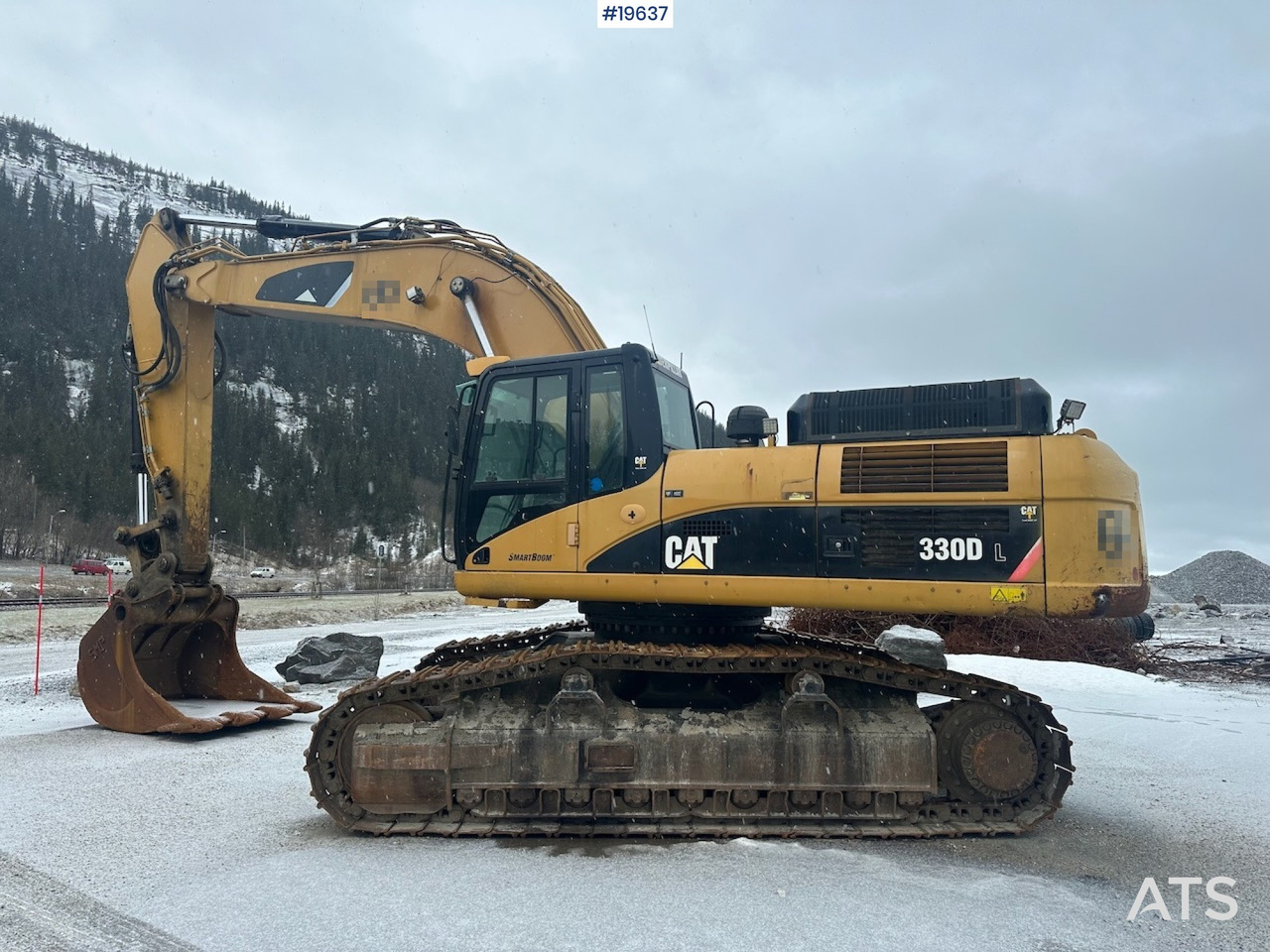 Bagger Caterpillar 300D: das Bild 10